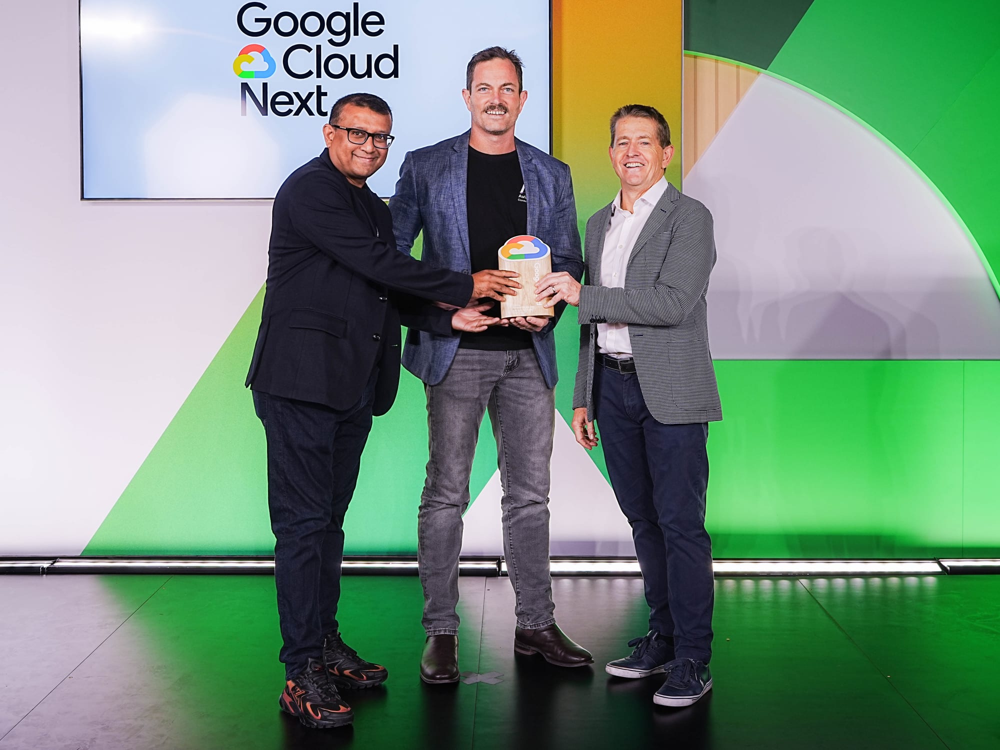 Aviato Consulting receiving the 2026 Google Cloud Partner of the Year trophy on stage at Google Cloud Next '26